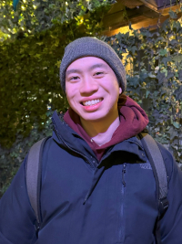 Jason smiling while wearing winter apparel.